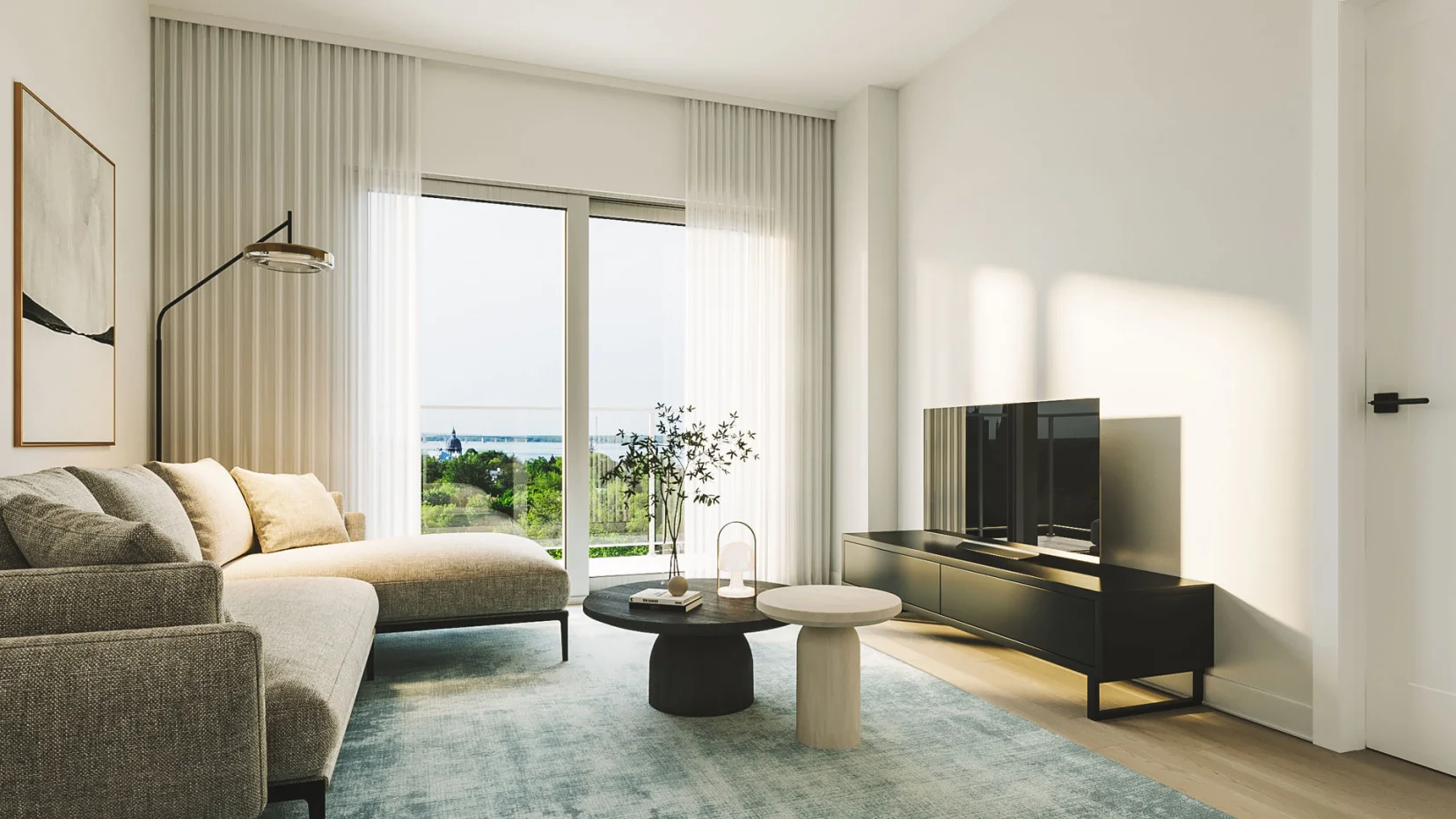 Salon lumineux avec vue sur le fleuve dans un appartement du Florent, Trois-Rivières