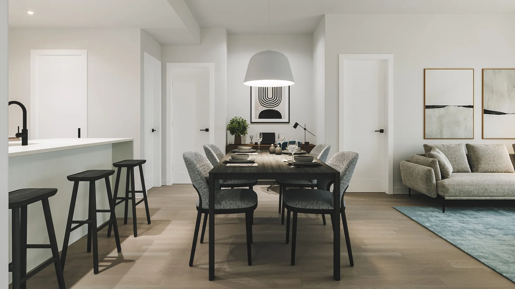 Cuisine et salle à manger à aire ouverte dans un appartement du Florent